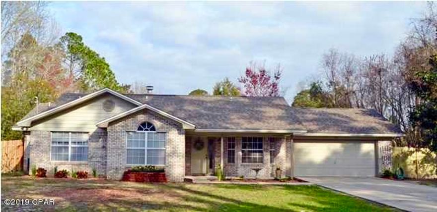 BEAUTIFUL HOME on a quiet street with a water view! This freshly painted 3 bedroom, 2 bath, home has updated flooring, kitchen with granite countertops, LG appliances and has been treated with great care showing pride of ownership. Comfortable living room in center of home has hard wood flooring and wood-burning fireplace. French doors open to the large 31x12 Sunroom (not included in Sqft) Sunroom would make perfect bonus or playroom. Master bedroom is very spacious featuring w/w carpet, walk in closet and on/suite bathroom highlighting the cultured marble double vanity, tiled flooring, tub with tiled surround, separate shower and water closet.