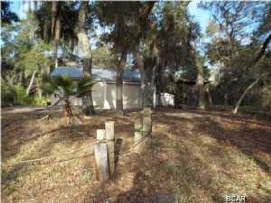 REDUCED!!!! Two Bedroom One bathroom cottage with shed in Alligator Point offered as is. The property is close to the boat launch and Bald Point State Park and is perfect as a vacation retreat. All sizes are approximate please verify accordingly.