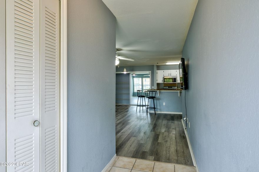 CURRENTLY UNDER CONTRACT, SELLER ACCEPTING BACKUP OFFERS. The unit is in great condition and well maintained and features granite countertops, upgraded wood cabinets, stainless appliances.Brand new dishwasher and stove.Brand new kitchen sink and faucet.Luxury vinyl plank in the living room.AC was replaced in 2019.Nautilus Cove is a gated condominium community,offers several amenities including a large resort-style pool, fitness center, clubhouse,kids playground,pet-friendly walking stations.Located in central Panama City Beach you are close distance to the beautiful famous sugar-white beaches and less than 2 miles from Pier Park.Not only is it a solid place to live,convenient to local schools and shopping,but it has potential as a long-term rental bringing cash flow to the new owner.