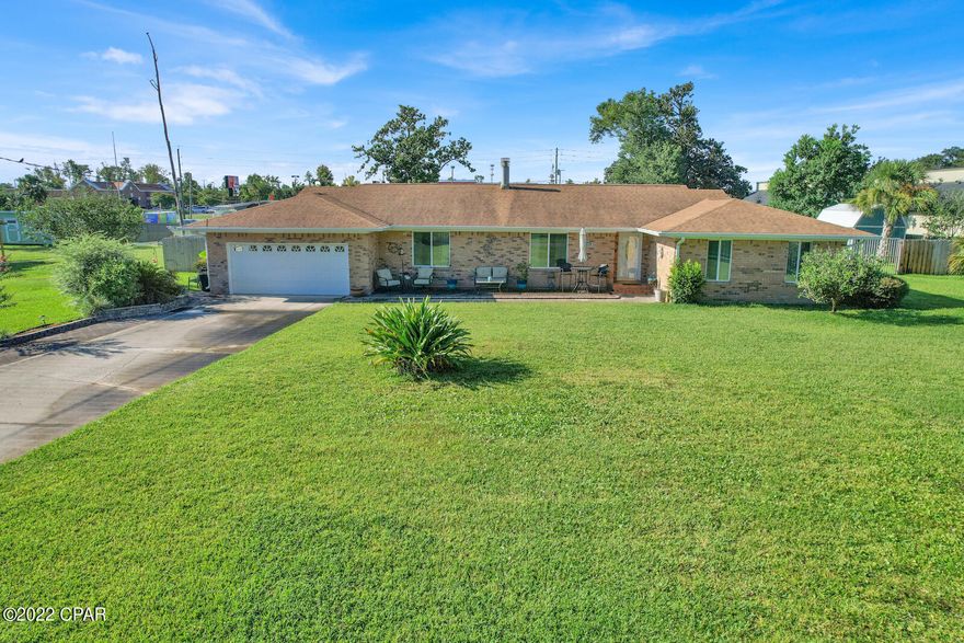 BACK ON MARKET. NO FAULT OF THE SELLER. THIS IMMACULATE HOME IS ALL ABOUT THE LOCATION & PROPERTY CONDITION. LOCATED JUST A FEW BLOCKS FROM THE BAY. A SHORT DRIVE TO THE VERY POPULAR ST. ANDREWS WHERE YOU CAN DINE, SHOP AND LAUCH YOUR BOAT FOR THE DAY. YOU ARE ALSO CLOSE TO THE BEACH, COLLEGE AND ALL SHOPPING ON 23RD STREET. THE KITCHEN IS NEWLY REMODELED WITH UPGRADED APPLIANCES, CABINETS AND GRANITE COUNTERTOPS. OFF THE KITCHEN IS THE SPACIOUS LAUNDRY ROOM AND OFFICE. LOCATED ON THE OTHER WING OF THE HOME THERE IS A LIVING ROOM/ DINING ROOM WITH A FAMILY ROOM SEPERATED WITH A BEAUTIFUL DOUBLE SIDED FIREPLACE. THERE IS A 21X16 SCREEN ROOM THAT IS AN EXTENSION OF THE LIVING ROOM THAT IS PERFECT FOR ENTERTAINING. THE  BEDROOMS ARE SPACIOUS AND EACH BEDROOM HAS A FULL BATH ATTACHED.. MASTER IS LARGE AND HAS 2 SEPERATE  ENRTY WAYS BACKYARD IS LARGE. TOTAL YARD IS AN 1/2 ACRE. THE SIDE YARD HAS PLENTY OF SPACE FOR A LARGE BOAT/ MOTORHOME/ RV. THERE ARE ALSO 2 IMMACULATE STORAGE BUILDINGS IN THE YARD, THERE IS AN IRRIGATION SYSTEM, STORM SHUTTERS, SPRINKLER SYSTEM, CULLIGAN  TANK, FIRE PIT FOR FALL EVENINGS. PLEASE VERIFY ALL IMPORTANT INFORMATION. CALL FOR YOUR PRIVATE SHOWING.