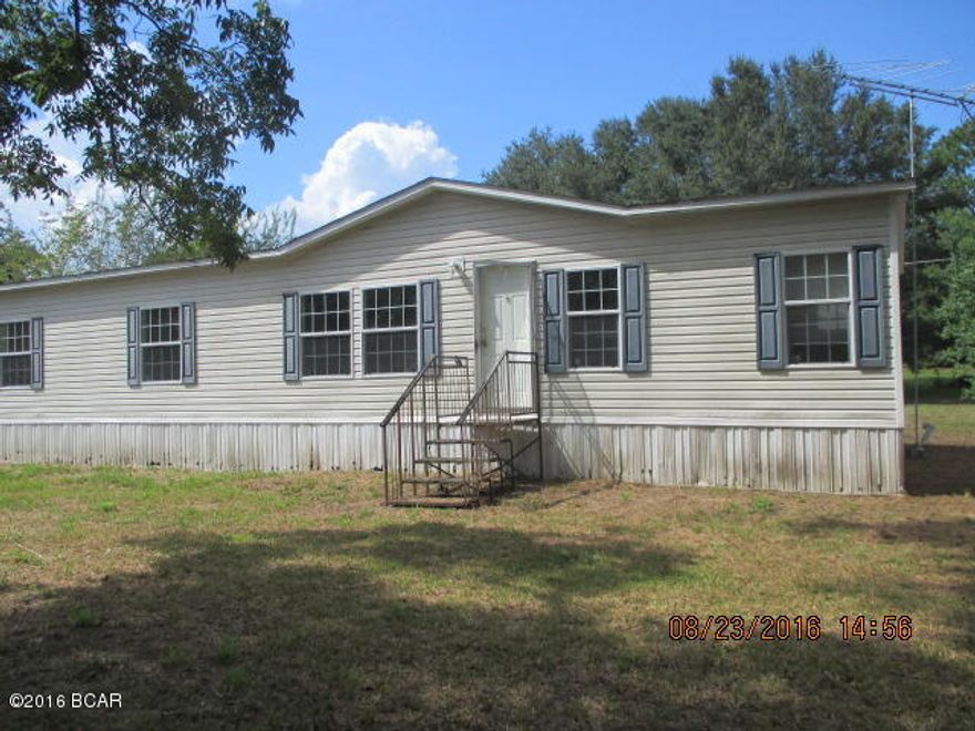 4 Bedroom 2 Bath Manufactured Home on City Lot in Sneads.  Close to Lake Semiole, this could be an investment for the Fisherman or a Family home for those who love the small town atmosphere. Great Investment property that won't be on the market long!