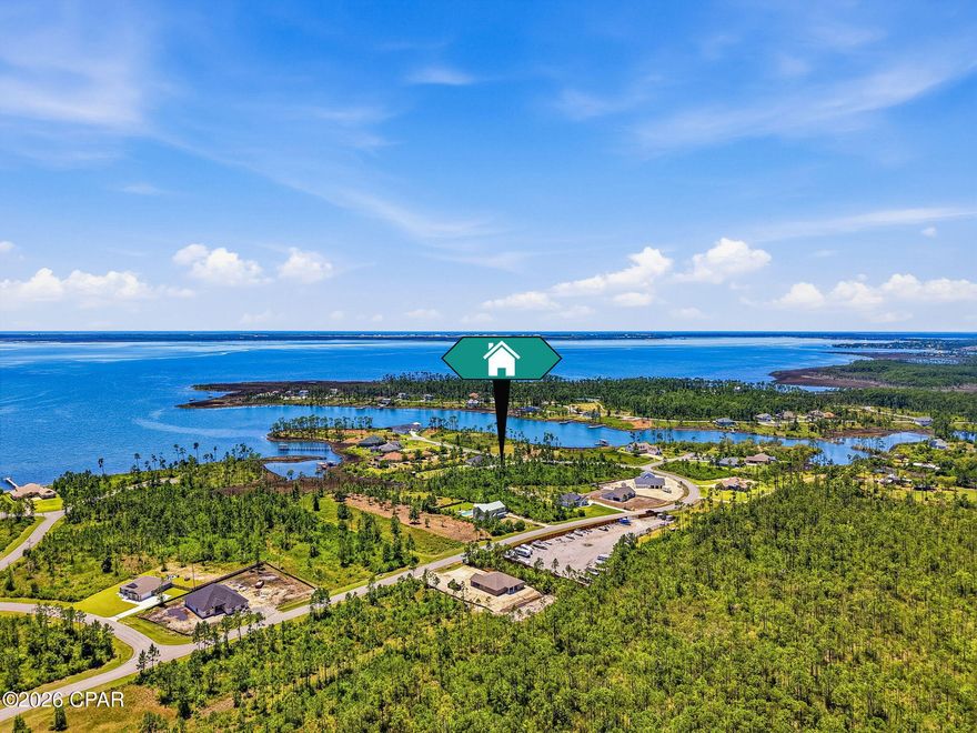 Nestled within the gated coastal community of Laird Bayou, this beautiful vacant lot on almost a full acre offers the perfect canvas to build your dream home. Surrounded by natural beauty and a peaceful, serene atmosphere, this spacious homesite provides both privacy and a true sense of coastal living. 
 Residents enjoy exclusive access to a community boat ramp with Bay and Gulf access, making it ideal for boating, fishing, and water enthusiasts. The neighborhood also features a refreshing community pool and the convenience of private RV and Boat storage.
 Whether you're envisioning a full-time residence or a relaxing coastal retreat, this property combines tranquility, security, and exceptional amenities in one desirable location.