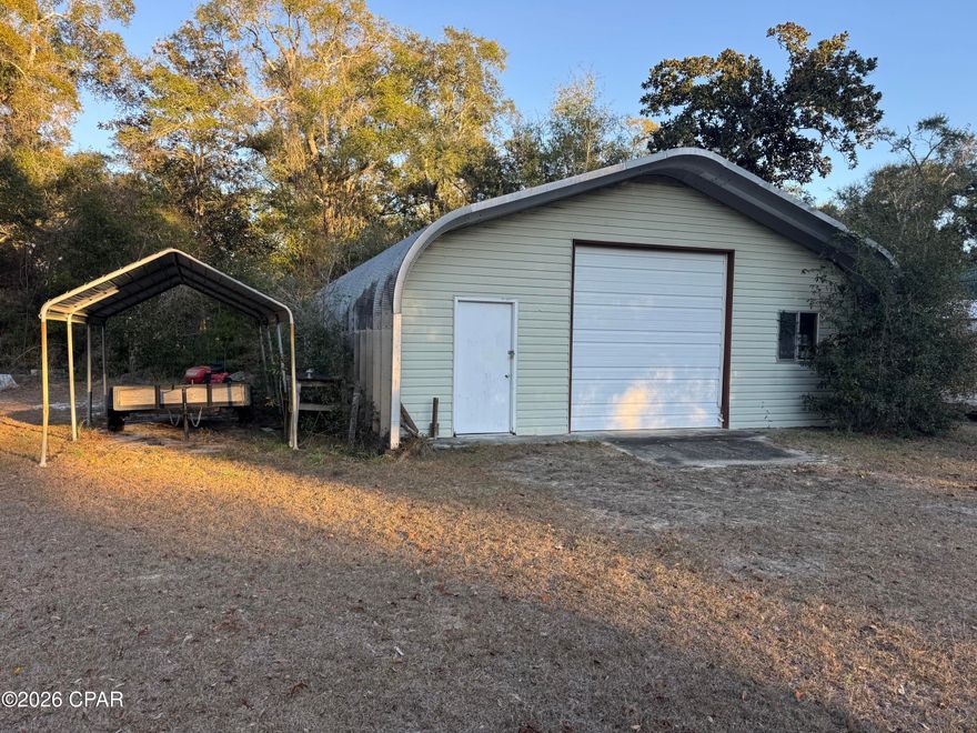 Beautiful lot with warehouse!  Location is at Steelfield Fish Camp in Walton County, just 25 min from Pier Park off Hwy 79.  Steelfield Fish Camp is one of the most beautiful and peaceful places in NW Florida.  This community is paradise for someone looking for a place to access the Choctawhatchee River, surrounded by hunting land, close proximity to the InterCoastal waterway with riding leases for your side-by-side and plenty of other activities to fill your days!  This listing features a 30 x 50 warehouse with two 12ft roll-up doors, concrete floor, no leaks, surrounded by beautiful heritage oak tree and grassy wide open spaces ..just waiting for your RV or weekend getaway!  ADDITIONAL ADJACENT PROPERTY AVAILABLE.  Three additional lots available at $25k each.
Listing agent is related to owner.