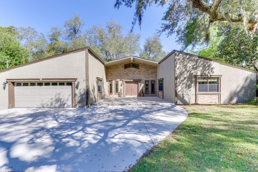 The absolute best deal and most beautiful waterfront property you’ll find at this price. This amazing 4 bedroom, 2 bath, plus an office/florida room has more than 2,400 sq.ft and is breathtaking the moment you pull up. Located in the very popular Lakewood subdivision you’re not only in a great neighborhood but you’re also on a beautiful .9 acre lot with more than 240 ft. on the water. This home is like new and the features throughout are endless. You won’t believe just how great they are until you see it in person. Just a few of the upgrades include: Custom kitchen from top to bottom with high-end appliances, hardwood floors and new carpet, tiled showers, a Rinnai tank-less water heater, sprinkler system, AC less than 5 years old, oversized driveway perfect for your boat and/or RV, a 24x21 deck off of your living room french doors, and also a basement perfect for extra storage. The mature oak trees and magnificent views of this 125 acre lake with leave you speechless. Call us to view your new home today!