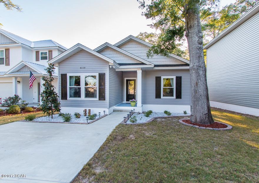 The moment you step foot into this absolutely gorgeous home you’ll fall in love. Located in the beautiful development of Lakeshore Landing, the price and condition of this 4 bedroom can’t be beat. Located only 10 minutes to the Panama City Mall and 15 minutes to Tyndall Air Force Base make this awesome home very convenient no matter where you work. Not only is the home like BRAND NEW, you’ll also love the large back yard and covered deck out back. If you weren’t already convinced that this is the perfect home for you wait until you see the kitchen!! High-end cabinets, stainless appliances, and the most beautiful granite and backsplash you’ve ever seen. Don't miss out on your opportunity to live in a quiet and safe neighborhood where everyone loves to help each other out.