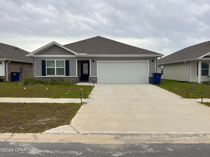 Move in and enjoy the modern convenience of a 2023-built 3-bedroom, 2-bathroom home in Panama City, FL. This stunning property boasts energy-efficient features and a sleek, contemporary design.

Unwind and connect in your vibrant community, featuring a resort-style pool with a dedicated splash pad for the little ones. Challenge yourself in the community gym, gather with friends at the outdoor kitchen with grills, or host family picnics in the spacious community center.

Picture perfect living awaits! This home offers the perfect blend of relaxation and entertainment, ideal for families or those seeking an active lifestyle.

*1/2 off security deposit for active duty military*