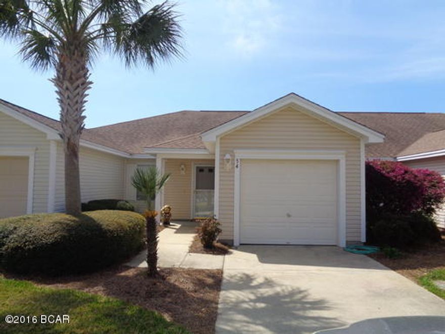 Beautiful town home located in the popular Palmetto Trace subdivision which includes a community pool. This property will impress on entry - with raised ceilings, wood laminate floors, updated stainless steel appliances, split bedroom plan with master suite that features his/hers closets and double vanity. The property also has single car garage and rear patio area. No Cats, one small dog possible upon owner approval