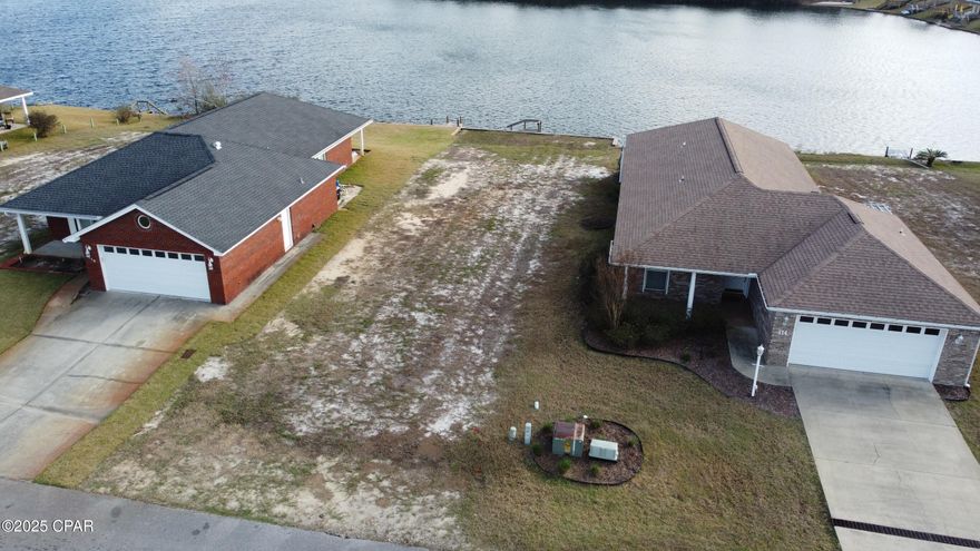 Under Contract - Taking Back Up offers
Build your new home on this pristine lake front property located in the heart of Panama City! Lake Marin is a one-of-a-kind subdivision where you can enjoy the beauty and amenities of lake life while still living in town near your favorite restaurants and shops! This lake is fed by three natural springs which keep the water fresh, clean and safe for swimming and fishing. Trolling motors are allowed on the lake, you will often see people of all ages enjoying kayaking, canoeing or paddle boarding. Property owners say the fish are plentiful and  the sunsets are gorgeous! This is one of the last remaining lots found on Lake Marin. ***Please click on the videos link under the 'more info' tab to view drone footage of the lake and lot. 

HOA fees include grass cutting (Mar-Nov), monthly yard fertilization/weed services and Lake Doctor weed control.