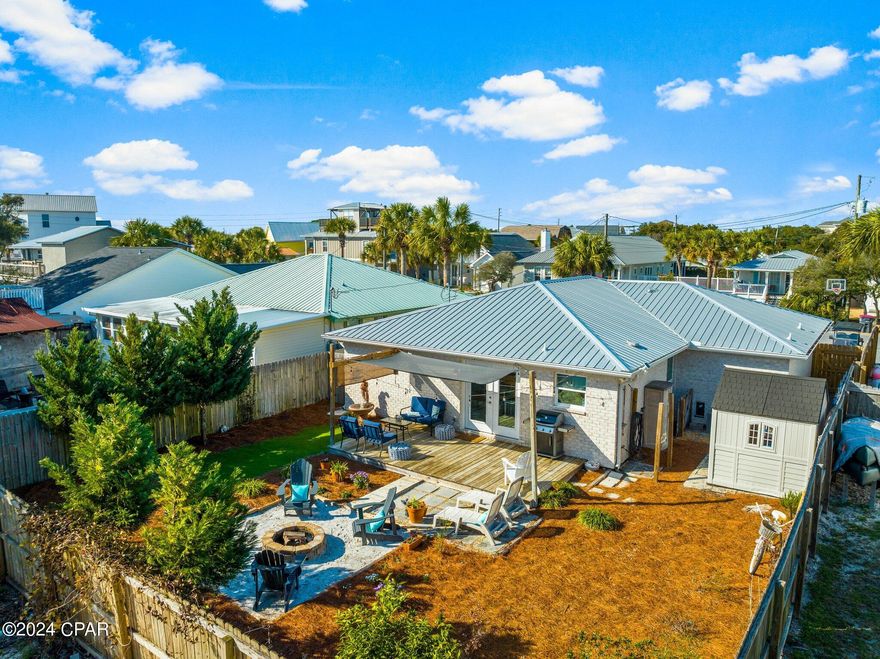 CURRENTLY UNDER CONTRACT, SELLER WILL CONSIDER BACKUP OFFERS .Fully Remodeled GORGEOUS Beach home on the west end of the beach, move in READY!!!  High end furnishing, soft colors and lots of light, crown moldings, vinyl windows, shiplap, solid surface luxury vinyl flooring throughout are just a few of the many upgrades!!!  The back yard is an oasis and has plenty of room for a pool, but for now it is complete with a fire pit and natural landscaping, outdoor shower and darling seating area.  The home is located so close to the beach you can smell the salt air and hear the waves crashing!!!! Give your favorite Realtor a call today, vacant and easy to show.