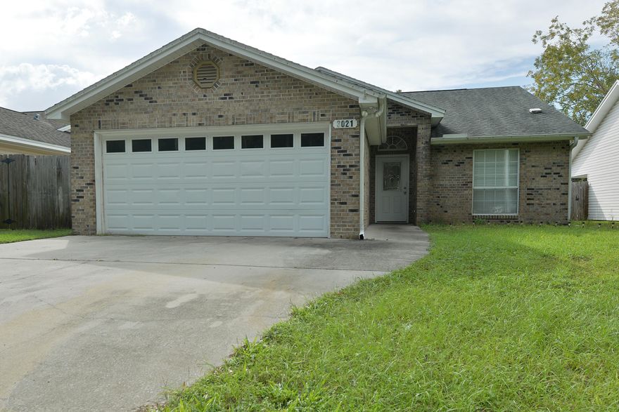 Move in Ready! This quality built 3 bedroom 2 bathroom home is located in the heart of Panama City. With more than 1,400 sqft of heated and cooled space you and your family can enjoy the perfect setting for relaxing or entertaining. Highlights include a new roof, a two car garage, a storage building, updated flooring and a covered back patio, perfect for get togethers. The spacious kitchen features stainless steel appliances, tile flooring and a large breakfast bar. The master suite has updated flooring and is graced with a private master bath. The additional bedrooms provide plenty of space for storage or study. This home is a must see, don't hesitate to schedule your showing today. 100% financing available, Call for more information.