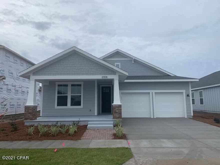 This Anna Maria style is our most popular single story plan, featuring an incredible open floor concept! This 3-bedroom / 2-bath, 1849 sf Florida Cottage style home has a spacious split bedroom plan with a phenomenal Master Suite. Relax on your front porch and take in the Bay breeze or have fun entertaining on your large covered patio in the back! Gorgeous large windows for natural light cover the home. 10 ft ceilings, granite countertops, stainless appliances, and designer kitchen cabinets are showcased in this home. Additional luxury options are available for upgrade. The exterior design includes hardiboard construction with 2''x6'' exterior wall construction & architectural shingles, sprinkler system, landscaping & more. All Samuel Taylor Homes feature energy saving packages, creating huge savings for energy bills and insurance. SweetBay are unlike any other community in Bay County - North Bay with access for kayaking, canoeing, paddle boarding, pocket parks, a retreat-like swimming pool, basketball court, community walking & jogging trails, an amphitheater and very pet & people friendly! Come see us at the SweetBay Community today to visit the Anna Mario model plus 8 other models Samuel Taylor Homes offers - let us build your Dream Home!