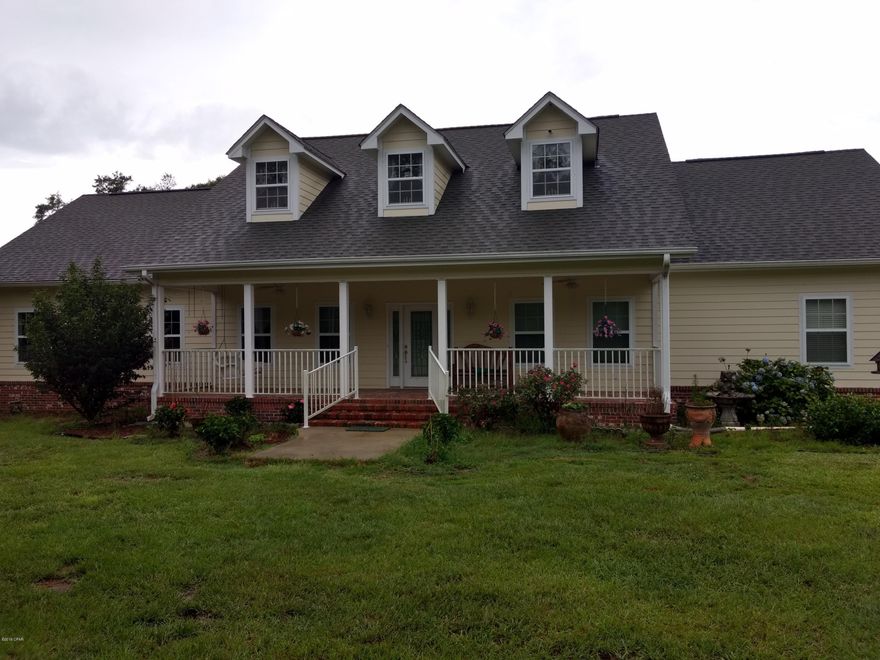 Beautiful custom built home on ten acres, with lots of highway frontage on 177-A. Well landscaped yard with lots of flowers and mature fruit trees. As you enter the house through the large front porch, you will see great attention to detail throughout. Has a spacious gourmet kitchen, with granite counter tops, center island, beautiful custom cabinets,double sinks, large pantry, and stainless appliances. Features crown molding, hardwood floors and lots of storage space throughout home. The big master bedroom features a beautiful bath with claw foot tub and separate shower. Sit out on the back enclosed patio and watch the birds and deer. Very nice guest house out back, newly renovated. Has a large enclosed barn and a 24x24 pole barn. Beautiful little creek branch flows along back of propert