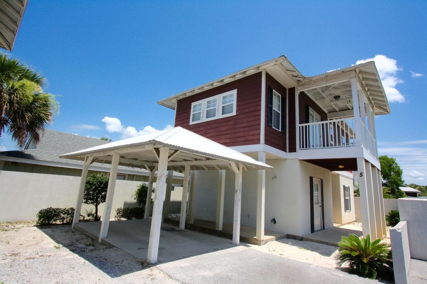 This home is inside a wonderful small community called Seaview Village. This home is one of eight homes ready to be your primary residence near the gulf or your home away from home. It would even be a perfect beach cottage rental. Wait until you see the kitchen with beautiful granite tops and custom glazed cabinetry. All three bedrooms are a comfortable size and have full bathrooms that feature pedestal sinks, showers or a bath tub. Room for storage of beach supplies under stairwell. The stairs and entire upstairs living area feature hardwood flooring. The upstairs living area has french doors leading to a nice sized balcony!! Private street with individual court yards. Outside showers, 2 car parking spaces and your own community pool. Age, Square Footage, room sizes approx, please verify.