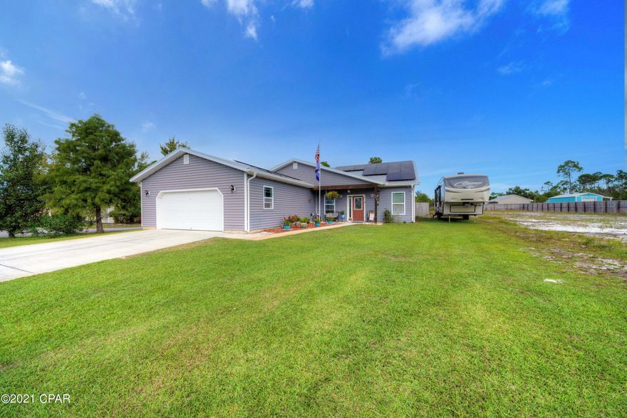 Located in a neighborhood loved by locals this home was custom built by the owner and is only a couple of blocks to the beach. This spacious one story home has a large open floor plan with lots of natural lighting. It features an oversized 2-car garage, stainless appliances, granite counters and under cabinet lighting in a large kitchen that overlooks the living and dining areas. Crown molding adorns the living areas, master bedroom and hallway. The master suite is large and has a spacious master bath with a large walk-in closet. The split bedroom plan offers two additional bedrooms with good sized rooms and closets. Huge boarded Attic as well.  The backyard is privacy fenced with a pool and storage shed. All of this in the preferred X flood zone. Call today for your private tour.