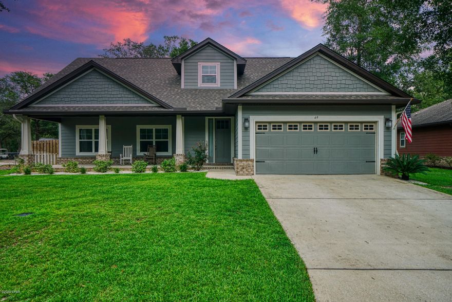 You have found home! This fabulous 5 bed, 3 bath craftsman-style home is centrally located in Freeport. Beautiful and custom finished home has 8' doors, LVP flooring in the main areas, granite countertops and stainless steel appliances. The master bedroom is large and the ensuite bath features a jetted tub. Master and 3 additional bedrooms are conveniently located on the first floor, along with the second bathroom. Upstairs has a large 5th bedroom and equally large bonus room that could be utilized as a 6th bedroom, along with the third bathroom. You will not believe the storage! Spacious lot has privacy fencing for the backyard with an open patio, perfect for entertaining. Serene, old Florida feel surrounds the neighborhood and is complimented by a community pool and ample parking.