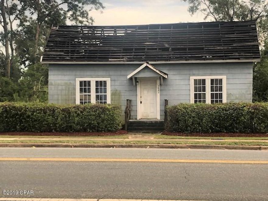 This is an investment property with lots of repairs needed.   It has 3 bedrooms, 1 and 1/2 baths, a large living room and an open dining/den area.   It has potential to become a great rental/income property.    It is in a good location with great access to the schools in Cottondale.