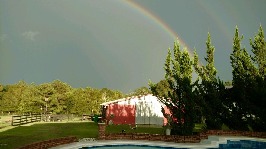 Country Living just outside of town! The house has Italian tile, and split floor plan, two car garage, top of the line appliances, gas fireplace, tray ceiling in the living room and master bedroom, two walk in closets in master bathroom and much more! The Barn has an air conditioned office, tack room, stalls, generator hookup to the main house and so much more. The property is fenced and crossed fenced. The pool is salt water concrete. There is a gas hook up for grillin and chillin! This home has been well maintained! Bring your offer soon. It is priced to sell!