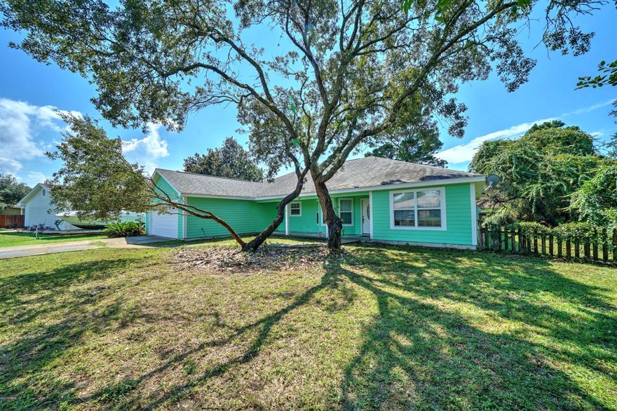 NEW ROOF COMING! Built in 2005, this home's exterior was painted in August of 2018.  It is a one level home in a terrific ''Beach'' location with room to spare on 1/3 of an acre. The Master Bedroom is on one side of the home along with a bonus room that can be used as another bedroom, office or gym.  The 22 x 22 Garage is what ends up on most wish lists these days. The 7 x 28  Front porch is welcoming and there is a large den for comfort and for  entertaining. You are so close to the Grand Lagoon and to  the Gulf of Mexico- Shopping and Restaurants are minutes away- No flood insurance is necessary and there are no HOA  dues- This home in popular Panama City Beach is in a great school district too- Hardie Board siding and a pro-bolt threaded rod wall system are positive features too!