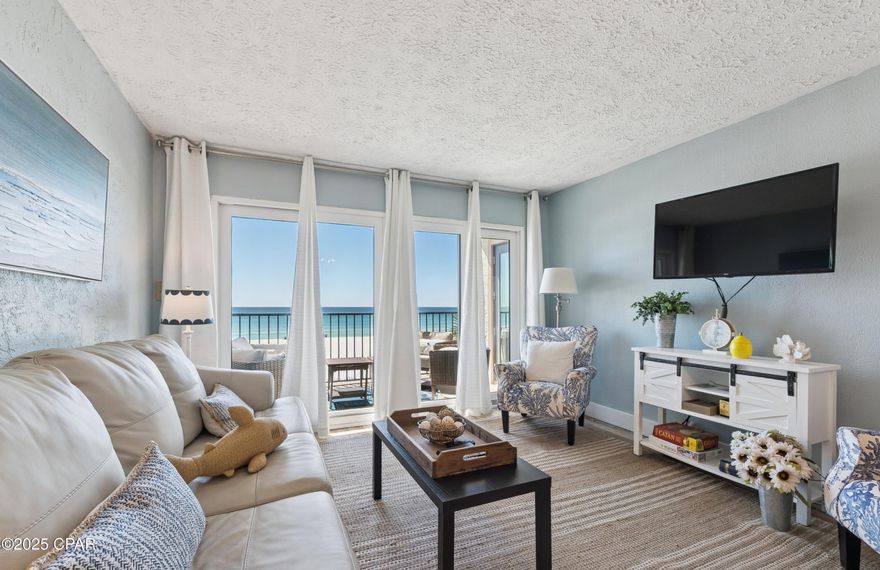 Experience true Gulf-front living with this rare opportunity to own the only beachfront condo currently available in Sugar Beach. Rental projections of $62,500 in 2026 and $71,800 in 2027. This beautifully updated third-floor unit combines modern style with the relaxed charm of coastal living. Enjoy breathtaking, unobstructed views from your private balcony—perfect for sunrise coffee or sunset relaxation. Inside, the open layout features a Gulf-facing primary suite with direct balcony access, a fully renovated kitchen with quartz countertops, tiled backsplash, and stainless steel appliances, plus updated LVP flooring and refreshed bathrooms with quartz vanities. The Sugar Beach community offers resort-style amenities including a large pool, tennis courts, grilling area, and clubhouse. Its well-kept facilities and central location make Sugar Beach a true hidden gem in Panama City Beach—offering both convenience and serenity. Ideal as a personal beach retreat or proven short-term rental, this turnkey property blends comfort, quality, and strong investment potential in one of the area's most desirable coastal communities.