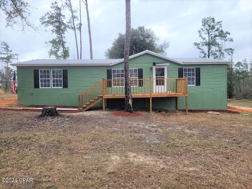 3-bedroom, 2-bath doublewide mobile home near Marianna, Florida. This home is located in Eagles Landing and has access to Indian Springs new golf course. Central heat and air, stove, refrigerator, dishwasher and washer/dryer hookups. Split-bedroom floor plan with large closets throughout. There is a breakfast bar separating the kitchen from the dining area (appliances to be installed prior to renting). Comes with underground utilities, city water and city sewer. Nice view of Lake Princess with fishing allowed on the premises. Eagles Landing is just getting started with planned lighting, cameras, rock driveways, walking trails and a fountain with lights on the lake. Only minutes from Marianna shopping and schools. All property sizes and ages are approximate, please measure and/or verify if important. Small pet is allowed with a $250.00 pet fee.
