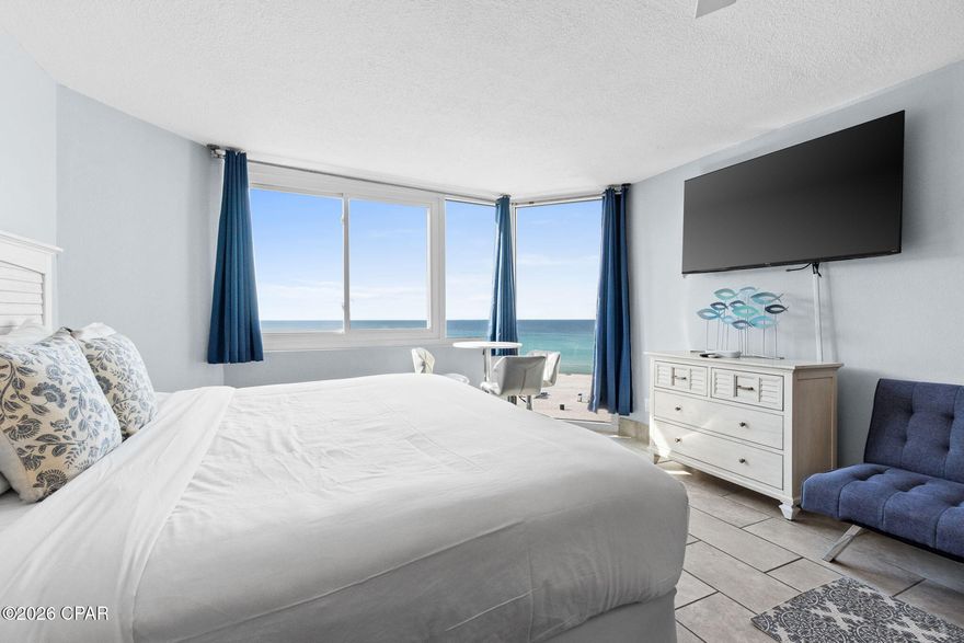 The Perfect Beach Retreat!  Beautifully updated Gulf front Studio Condo located at Top of the Gulf resort in Panama City Beach!  This studio condo features a tiled floor throughout, full kitchen, king size bed and ample natural light. There is even a large storage closet that some owners have turned into a bunkroom.  In February 2026 the electrical panel was replaced along with all of the outlets.  The location could not be any better! Nearby attractions include Ripley's Believe It or Not, Wonderworks, Signal Hill Golf Course & St. Andrews State Park. Ready for Lunch or Dinner?  Walk just down the beach to one of the most well known restaurants in PCB - Pineapple Willy's! There are also many other dining, shopping and entertainment options a short stroll away.  
OPENING SOON - Tootsie's Orchid Lounge.  Located right on the beach just steps from Top of the Gulf.  It will feature Live Music, Food & Drinks in a massive 36,0000 sqft venue.
Schedule your showing today!