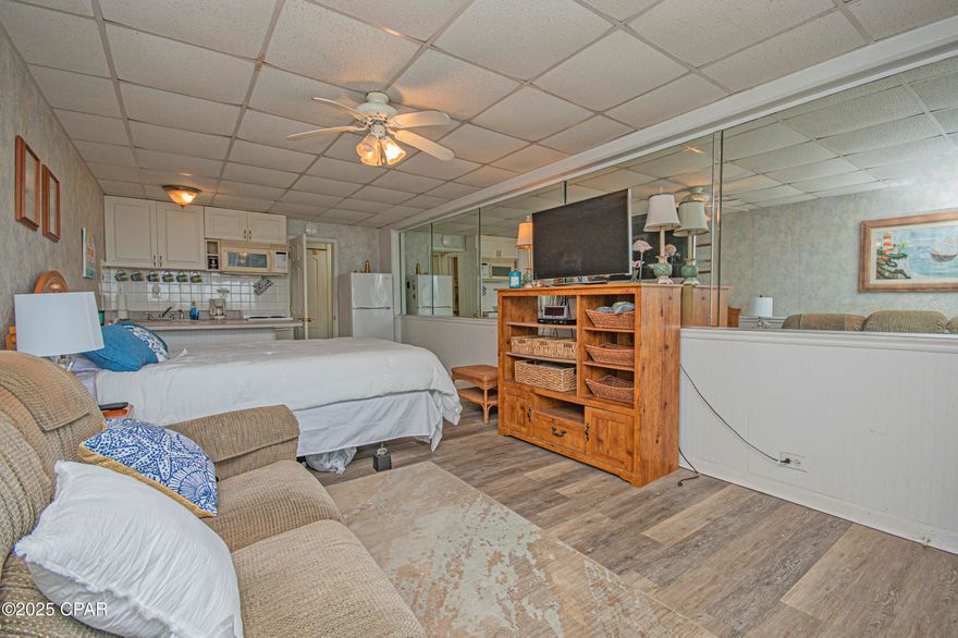 Welcome to your coastal escape at this beautifully positioned second floor beachfront condo, where every day feels like a vacation. Step outside and let the shimmering gulf waters greet you instantly, your view framed by bright natural light and the soothing sound of waves that roll up on the shore. From sunrise pastels to fiery sunsets the horizon becomes your daily artwork. Imagine slow mornings spent enjoying coffee while the sea breeze drifts through, afternoons with your toes in the sugar white sands, and evenings watching the sky fade from blue to amber as dolphins play offshore. This unit offers an effortlessly relaxing atmosphere an ideal blend of comfort and coastal charm. Whether you envision a serene personal getaway or a high demand beachfront rental, this condo delivers the ultimate Panama City Beach experience. Perfectly located near local dining, shops, entertainment and the vibrant energy of pier park, yet tucked into a peaceful stretch of coastline where life moves at a gentler pace. Let your imagination wander to the lifestyle waiting here, sunny days, salty air and the kind of memories only a true Gulf-Front escape can give. Your beach dream begins at 14401 Front Beach Rd. #209