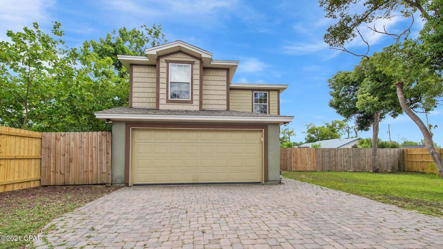 This charming 3bd/2.5bth is centrally located near Historic St. Andrews, shops/dining near 23rd St and a short distance to Hathaway Bridge towards PCB. This 2-story home offers hardie board exterior with new roof and fully fenced in backyard. Interior features open floor concept, with featured crown molding and recessed lighting downstairs. Kitchen showcases stainless steel appliances with beautiful wood cabinets and granite countertops. Downstairs offers half bath for guests and plenty of storage with pantry and additional cabinetry in the 2 car garage. Upstairs opens up to extra space in the loft area that would be great for play area, study or even a home gym equipment. 2 bedrooms plus spacious full hall bath make for great space for family or guests. Master bedroom includes ensuite bathroom with custom tile shower and walk-in closet with additional custom built-in storage. Call to schedule a preview today! All sizes/measurements are approximate; please verify if important.