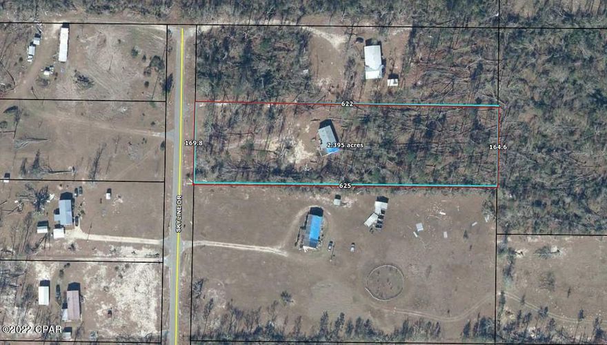 Nice 2.39 acre lot that has no deed restrictions. There is well and septic on the property but the seller doesn't guarantee either of them.  There is a mobile home on the lot that will need to be repaired or removed.