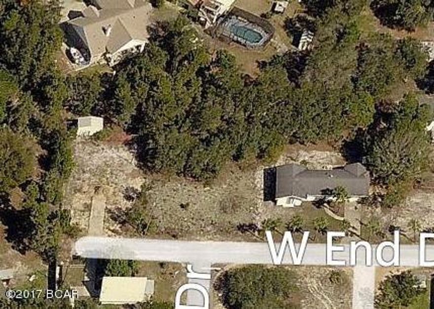 High and dry lot just blocks from the beach makes for a perfect place to build your dream home! Come by and see this large, shovel-ready lot today!