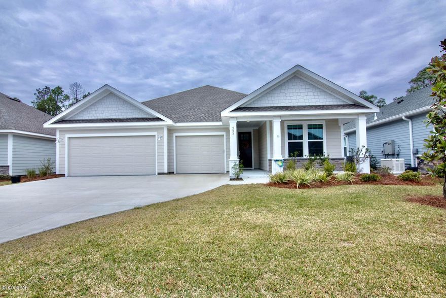 CURRENTLY UNDER CONTRACT, SELLER ACCEPTING BACKUP OFFERS. This 5 bedroom, 3 full bathrooms and over 2,100 sq.ft of comfortable living space is the perfect setting for relaxing and/or entertaining. This serene family friendly community provides you with privacy all while being a short distance to shopping, dining, great schools and the world's most beautiful beaches. Breakfast Point Academy is also walking distance and it is rated an A school in Panama City Beach. INTERIOR features of this coastal inspired home offers a private grand Foyer entrance, large volume Great Room with an open floor plan, kitchen with gas cooktop, center island, custom cabinetry with soft close drawers and stainless steel appliances, Master Suite with tray ceiling, expansive tiled shower, double vanity and large walk-in closet. The 5th bedroom can be used as an office or a bedroom because it has a closet. 

This home also has upgraded finishes including plank flooring, granite countertops, Barnett white cabinets, stainless steel sink, tiled Kitchen backsplash, Moen plumbing fixtures, Whirlpool "Gourmet Kitchen" stainless steel appliances and much more. The appliances Includes:30" Chimney Hood in Stainless Steel, 5-Burner Gas Cooktop in Stainless Steel, Countertop Microwave with Trim Kit in Stainless Steel, Front-Control Dishwasher in Stainless Steel and a 5.0 Cu. Ft. Single Wall Oven in Stainless Steel.  

The EXTERIOR of the home features a 3 car garage and a covered front porch, Aspen stone accent with a Rain Bird sprinkler system.   

The seller has also recently updated the garage with an epoxy coat on the floor, storage cabinets and a rail system in the garage. He has added privacy fencing to enclose the backyard. The nest doorbell, ring security camera in the backyard and smart light switches have been installed. The Lanai and back patio has been extended and enclosed. Every bedroom has ceiling fans.

NOTE: Refrigerator does NOT convey.