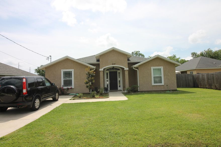 Cozy home nestled in a super neighborhood very close to Tyndall ready for a new family. This home as a spacious open floor plan, 4 beds and 2 baths fenced back yard and screened porch for those cozy nights out side. Don't miss this home it is not going to last long