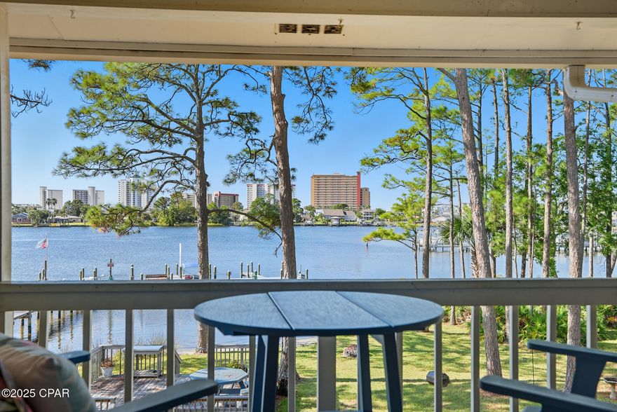 This stunning 2nd-floor unit offers waterfront living at an incredible price point! Assigned parking is located right out front for convenience.

Inside, you'll find a spacious layout featuring a must-see master suite with a walk-in closet and private bath, plus a second bedroom and full bath. The open kitchen and family room showcase gorgeous lagoon views, with granite countertops, a large island with undermount stainless sink, and wood-look vinyl plank flooring throughout. A cozy fireplace with a shiplap feature wall adds the perfect touch of charm.

Sliding glass doors lead out to a private deck where you can relax, take in the views, and enjoy the natural surroundings. A bonus storage room off the deck provides extra space for your needs.

Boat slips are available on a waiting list basis, and you'll be just minutes from the Gulf.