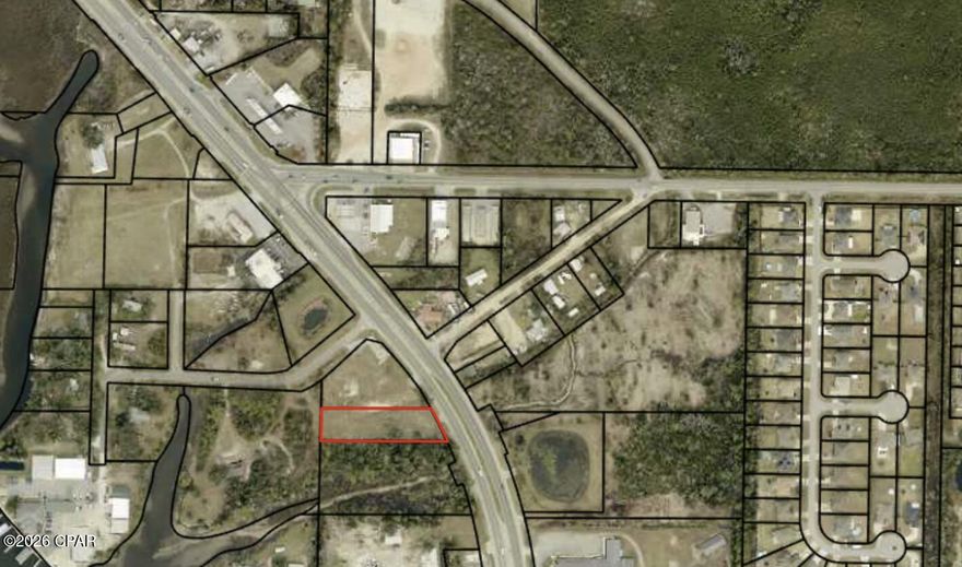 ±0.84-acre commercially zoned (C3) parcel located along the highly trafficked Highway 77 corridor in Southport. Positioned directly adjacent to the corner parcel at 7415 Hwy 77, this site offers excellent visibility and access to an estimated 29,000 vehicles per day.

The property benefits from prior development planning, including survey and conceptual layout work, providing valuable insight into site potential. Ideal for auto-oriented, service-based, or small-format commercial uses.

Available individually or in combination with the adjacent corner parcel for expanded development opportunity.