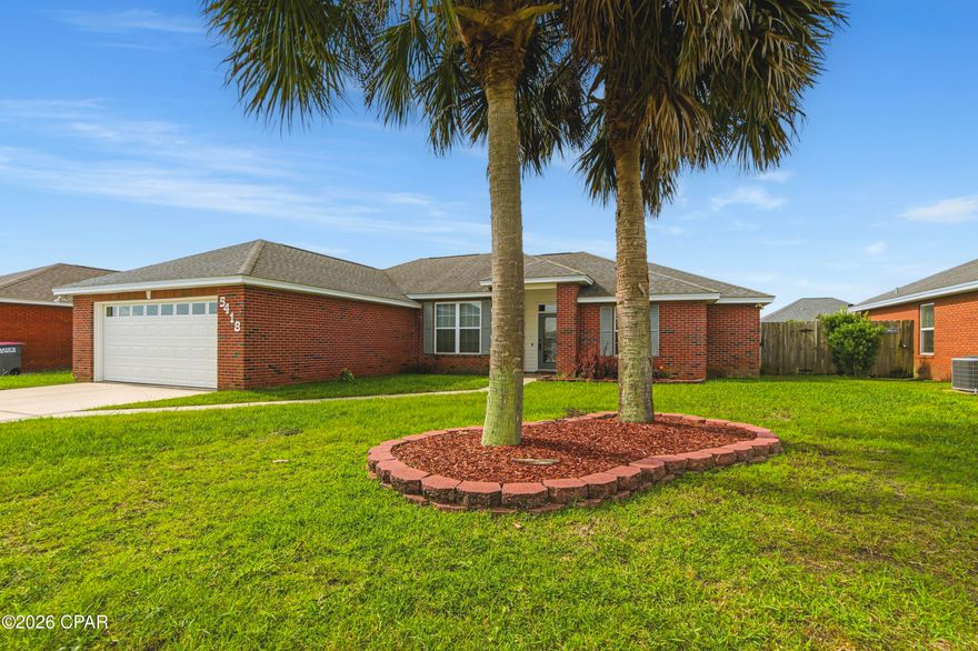 Located in the desirable Cherokee Heights neighborhood just off Hwy 231 and Star Ave, this 3BR/2BA home is close to schools, shopping, and a short drive to Tyndall Air Force Base. Publix and Starbucks are just 1.5 miles away, and the elementary and middle schools are only 2 blocks from the home.

The open floor plan features high ceilings, an electric fireplace, and a spacious kitchen and dining area. Bamboo plank and tile flooring run throughout, with carpet only in the bedrooms.
The split-bedroom layout offers privacy in the primary suite with double vanities, a jetted soaking tub, separate shower, and large walk-in closet. Bedrooms 2 and 3 also have walk-in closets. Outside, enjoy a Privacy-Fenced backyard with a Covered Porch, Garden Beds, and a Shed.  Also, aAdditional features include a 2-car garage, Stove, and Roof, HVAC, and Water Heater all approximately 7 years old. No HOA fees!