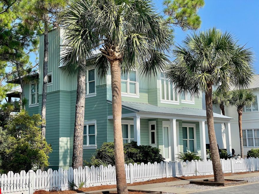 This pristine home, nestled in the pines and magnolias, abutting the pristine and protected wetlands of Carillon Beach is only steps from Beach Walkover #1 .  The home was designed by Walt Chancey, AiA, and built by Johnny Robinson.  It has 3 bedrooms, 3 1/2 baths and has never been rented.  It is in immaculate condition and ready to enjoy, with beautiful hardwood floors, large living and dining areas, lovely spacious porches, and tall ceilings. There is room to add a guest house or carriage house.    The owners of this lot own the adjoining lot, which is also for sale.  This home and the adjacent lot would make the perfect family compound.  With the purchase of the adjoining lot, an additional home and pool could be added to complete the perfect multi-family gathering spot at the beach.