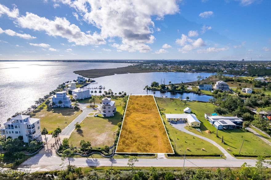 This is a beautiful, large waterfront lot just waiting for your beautiful custom home.  Westerly-facing, this lot is beautifully situated at the end of the road with an amazing view and large, deep lot that can accommodate a house that will only further enhance the natural beauty of East Bay and all the waterways beyond.