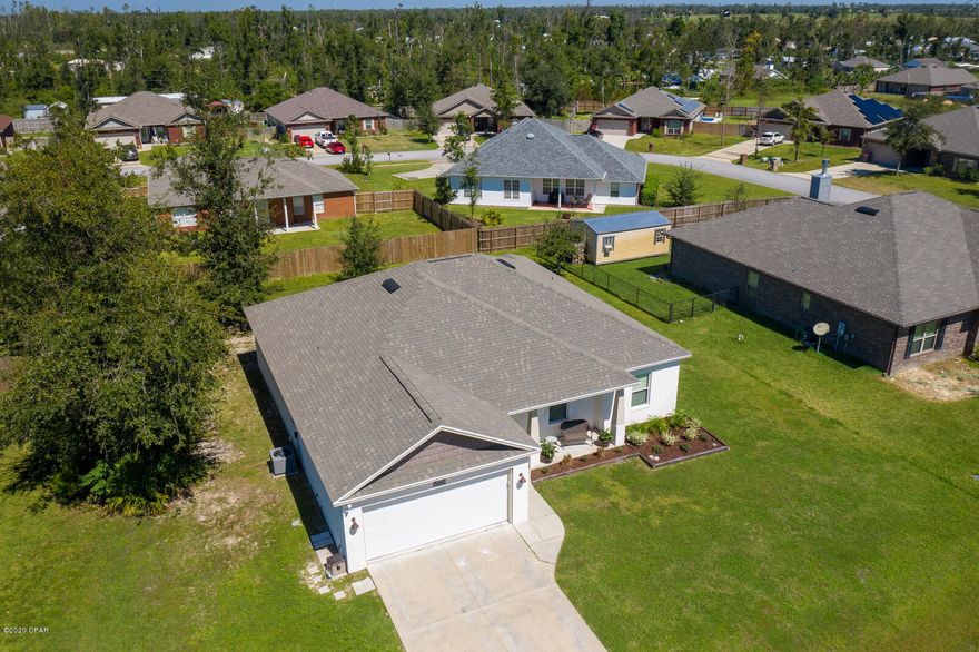 ***UNDER CONTRACT - SELLER TAKING BACK UP OFFERS***Meticulously Maintained, 3 large Bedrooms and 2.5 Baths. This home has many Energy Efficient Features All LED Lights, Fully Insulated Interior Walls, Low E windows & much more. This home had minimal hurricane damage but did receive a new roof! The interior features an open split floor plan, crown molding, tray ceilings in the Living room and Master Bedroom, recessed and upgraded light fixtures throughout, vinyl plank flooring & ceramic tile. The Kitchen is lovely with custom hardwood cabinetry, granite counter tops, all stainless appliances that convey with purchase!! A breakfast bar, Pantry & spacious dining area adjoins the kitchen. There is a very useful nook that is used as office area, a laundry room with storage cabinets The Master Suite is Beautiful, Large enough to comfortably accommodate a King Size bedroom set with lots of space. The Master Bath is roomy & features double vanity sinks, Separate 5ft shower with bench seat, whirlpool tub, His & Her walk in closets with lots of storage space & private potty room. There is also a convenient 1/2 bath for guests off the living room area. The additional 2 bedrooms are spacious & there is a nice sized Full bath with tub/shower combo. The outdoor living space is wonderful with this home, fully privacy fenced backyard, covered back porch, truly the perfect place to relax & enjoy a Fall day with your family! This home also has a spacious 2 car garage with pull down stairs & attic storage, Automatic Irrigation/ Sprinkler System in front & backyard, many energy efficient features! Transferable Termite Bond, No HOA Fees, Flood Zone X- No Flood Insurance Required  ***Measurements approximate please verify if needed***
**There is NO privacy fence on this property; the neighboring properties have a fence **