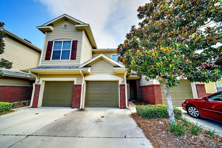 Great home in the beautiful Baldwin Rowe community. Baldwin Rowe is a gated community with a clubhouse, pool and lake. This centrally located 2 bed 2.5 bath home has all new paint and carpet. There is hardwood floors and tile downstairs. The kitchen has granite tile countertops. There is a screened patio off the living area. Very low maintenance living!