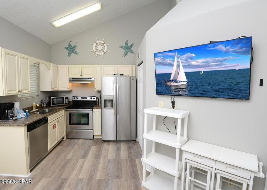 ATTENTION INVESTORS & ANYONE LOOKING FOR A GREAT BUY!!! GULF VIEWS FROM THE FRONT DOOR!! Great West End condo just steps from the beach. This condo had a complete kitchen update with new granite countertops, new cabinets, stainless appliances, new flooring installed. This TOP FLOOR unit has sky windows, gulf views, and cathedral ceilings making it very roomy and light. Beach access is directly across street. This property is THE perfect first time investor property or your own little getaway spot in paradise! The ENTIRE complex exterior has been reconstructed and renovated making everything brand new again! You MUST come see and feel what this property has to offer, with GULF VIEWS at only $199K and completley renovated in and out, how can you go wrong!! Come see this today and see for yourself! All info and measurements are approximate, buyer to verify if important.