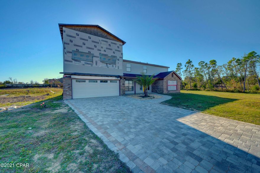 *CURRENTLY UNDER CONTRACT, SELLER ACCEPTING BACKUP OFFERS*



Investors! Get into this property while its in the current stage of reno-all materials have already been purchased, addition already added above garage, beautiful kitchen and baths already designed and partially installed, top of the line appliances and materials on around 3/4 acre in this part of Lynn Haven...what an opportunity! The improvements thus far include: new electric panel, new outlets, new kitchen cabinets/countertop, new siding, new roof, new pavered driveway and back patio, new paint/sheetrock (entire home), new bathroom tile, jacuzzi tub, new lighting throughout, palm trees, new doors/locks, new brick on side of home; stucco on back, new hurricane grade garage door/motor Viking stainless appliances, new hot water heater, engineering design w/ stamp for addl room over garage

*permit for addition will be needed
** all measurements are approximate and should be verified