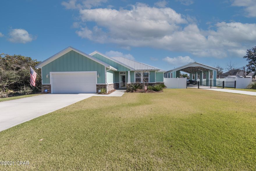 UNDER CONTRACT .SELLER TAKING BACK UP OFFERS .Custom Home just 2 years old. Built on a lot & 1/2 with a Matching Pole Barn Built on it. Perfect for boats, RV, Golf Carts. Plus a Grilling Place ! Inside is stunning .9' ceilings, Granite, Luxury Vinyl Plank Flooring .Bathrooms Tile .

The Appliances are Charcoal

Granite color by Samsung . 3 Bed 2 Baths splint Floor Plan

Family Room Opens up to the Covered / Screen Patio, Pool Area (45x22 )room)Electric Fireplace   with Custom Mantle . Trey Ceiling .Master Bath has a Huge Tiled Shower .  Double Vanities .Trey Ceiling in Master Bedroom . All of this and only a short walk to the Beach ! Lots of attention went into this Home as it was  Custom Built .