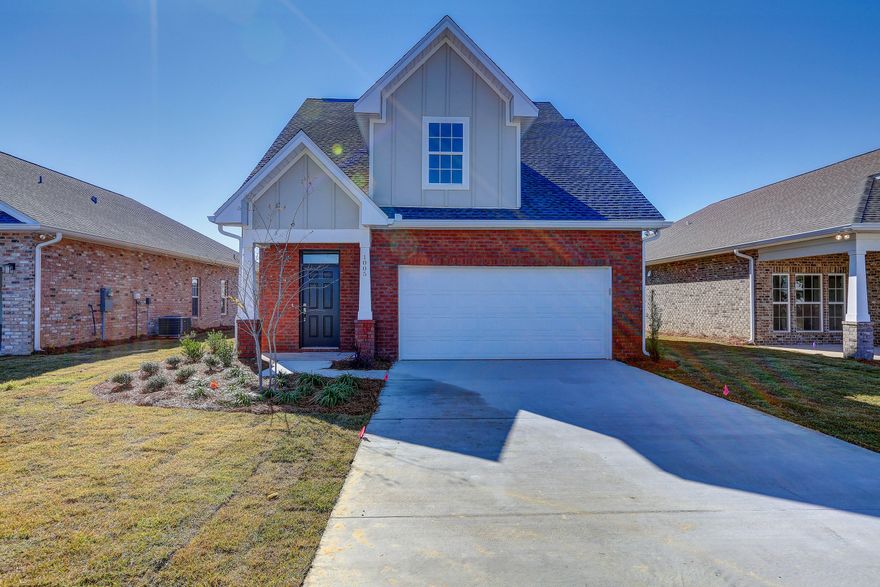 Seller offering  $2,500 in buyer closing cost!!!!!   New Construction brick home in St. Andrews. Superior location across the street from the Panama City Garden Club with access to the walking park and dog park. Just a short walk to the bay. Interior features include master BR on the 1st floor, vaulted ceilings in the family room and master BR, quartz countertops throughout, luxury vinyl plank  flooring, ample kitchen featuring 18' of breakfast bar, prep island, tons of cabinets, modern lighting, upgraded trim and hardware package,150 sq ft bonus room with full bathroom upstairs. Exterior includes rear porch with stained pergola,  fully sodded yard with sprinkler system, lush landscaping, 2 car garage, & guttering.  No HOA & no new buyer fees!