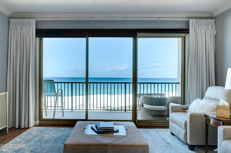 Experience the art of coastal living at its finest. Wake each morning to panoramic, unobstructed views of Panama City Beach's sugar-white sands and shimmering emerald waters from the privacy of your own balcony. This elegantly updated beachfront residence captures the sophistication of seaside living, blending timeless design with modern comfort. A sun-drenched open floor plan invites relaxation, featuring an expansive living area framed by floor-to-ceiling windows, a thoughtfully appointed kitchen with sleek appliances, and a dining space ideal for both intimate gatherings and entertaining guests.

The primary suite offers a serene retreat with generous closet space and a private en-suite bath, while the spacious guest bedroom includes its own full bath for ultimate comfort and privacy. Additional features include blackout curtains, pull-down mesh shades, and a full laundry room for everyday convenience.

Set within Summerwinds, one of the area's most coveted non-rental communities, residents enjoy a sense of peace and exclusivity. The residence includes a deeded parking garage space equipped with electricity, suitable for storage or EV charging, as well as hurricane shutters providing both privacy and protection.

Resort-inspired amenities enhance the experience, with two swimming pools both beachfront and one heated along with direct beach access to the soft sands and emerald shoreline. There is a Gazebo overlooking the fabulous emerald waters of the Gulf of Mexico and where owners gather around at sunset for fellowship and enjoyment.Whether envisioned as a luxurious vacation escape, refined investment property, or permanent Gulf-front residence, this condominium embodies effortless elegance and the unparalleled beauty of life by the sea.

All information is believed to be accurate; buyer to verify all details deemed important.
This condo also includes a deeded parking garage space with electricity, perfect for convenience, storage, or even charging needs.

Resort-style amenities complete the experience with a sparkling beachfront pool, and direct beach access. Whether you're seeking a vacation home, investment opportunity, or permanent residence, this condo delivers the best of Gulf-front living. While we believe all information to be accurate, Buyer to verify all information deemed important.