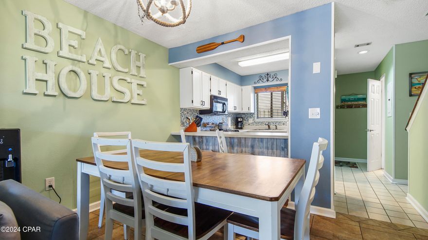 'CURRENTLY UNDER CONTRACT, SELLER WILL CONSIDER BACKUP OFFERS' UPDATED:  2BR/1.5BA End Unit, Condo. close to the beach in Portisde Complex.  This cozy beach getaway is ready for you to enjoy your time away from home.  Recent Upgrades include:  New kitchen cabinets & hardware, quartz countertops, backsplash, stove, dishwasher, all furniture & decor, custom bunk beds added, all lighting & freshly painted.  Owners have only used as a vacation getaway, but this unit would be great as a short term rental as well.   Portside offers fantastic amenities for residents and guests to enjoy. Three sparkling community pools, a hot tub, clubhouse, tennis courts, shuffle ball and a fitness center, ensuring you have endless opportunities for relaxation and recreation right at your fingertips. This well maintained complex is close to Pier Park shopping, easy access to the airport, restaurants and entertainment. PORTSIDE IS A VA APPROVED COMPLEX. Don't miss out on this one!