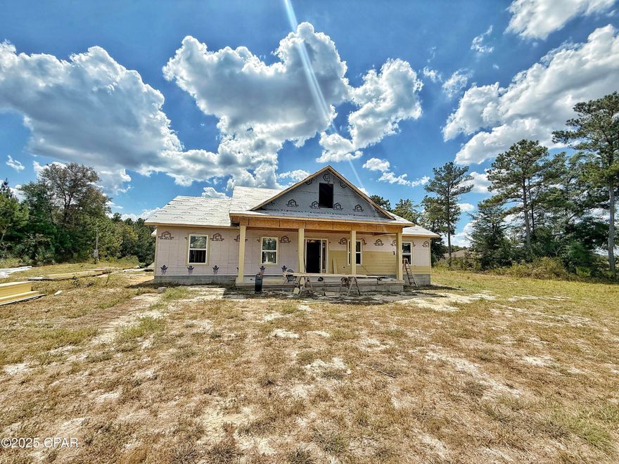 This brand-new 2,052 sq. ft. home by Hatcher Homes / Clint Hatcher combines modern design with the charm of a peaceful rural setting. Known for quality craftsmanship and stylish finishes, Hatcher delivers another beautiful home designed for both comfort and functionality.

Step inside to an inviting open floorplan with a vaulted ceiling in the main living area that fills the space with natural light. The spacious kitchen, dining, and living areas flow seamlessly, creating the perfect setting for everyday living and entertaining.

The large master suite is a true retreat, complete with two vanities, a walk-in shower, and convenient direct access to the laundry room. Two additional bedrooms and a second full bath provide plenty of space for family or guests.

Outside, relax on the covered front porch while enjoying the scenic farmland views. The 3-acre lot offers the perfect blend of privacy and usability, with deed restrictions to maintain property values while still allowing animals. Bring your chickens, pets, or even start a small hobby farm—there's room to spread out and enjoy country living at its best.

Don't miss this opportunity to own a quality-built home with acreage, designed for both style and convenience!
