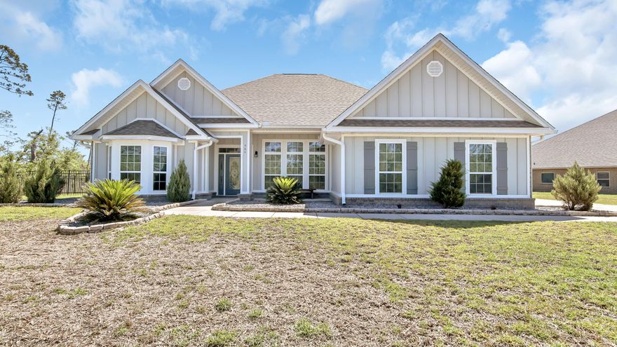 Better than New! This beautiful Home boast many upgrades & sits on a large lot! As you walk in you'll immediately notice the tile plank floors & open floor plan. Home has a dedicated office with french doors! Your family will love the formal dining room, gorgeous kitchen w/nice back splash, huge island, stainless steel appliance, granite counter tops, pantry, & eat-in dining area. The split bedroom plan offers much privacy. The master bedroom is large & has an amazing bathroom w/ a large tile shower, separate garden tub, massive closet, & double sinks. Outside you'll enjoy the view of the pond & watching the wildlife from your covered back patio. The yard is huge & fully fenced. Community offers a resort style pool & hot tub, 2 gas grills, playground, & recreational area. Truly a must see!