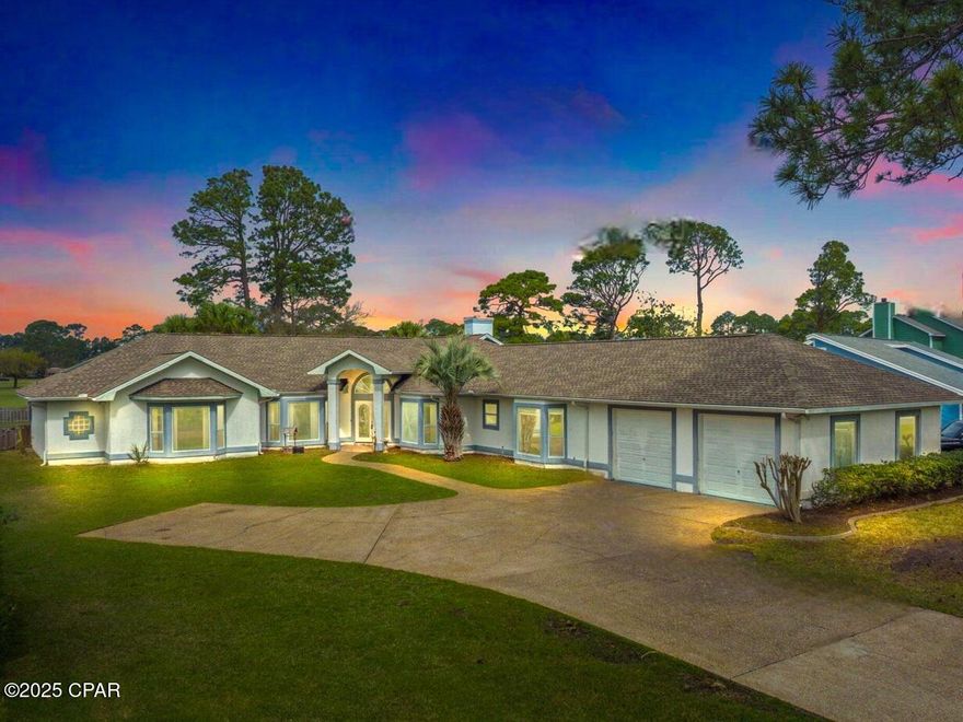 This is more than you can build for $218.50/sf.  Come see, easy to show. Welcome to 361 Eagle Drive in beautiful Panama City Beach, Florida. Located in the desirable tucked away Golf Course community of ''COLONY Subdivision'' mere blocks from the Gulf coast and just minutes from your choice of white sand public beaches, Pier Park, R, Seltzer, & Frank Brown public parks, St. Andrews State Park, public boat ramps, Duplin Winery, golf, dining, shopping, Gayle's Trail and the newly opened Top Golf and Pirates Voyage Dinner Theater (Much of this accessible by golf cart, scooter, bicycle, or even on foot). A very quiet and well-kept neighborhood with no vacation rentals allowed and NO HOA!

With its original charm and extensive modernizations totaling over $100K, this exceptional custom stucco residence offers a blend of open central space and secluded spa-like atmosphere thoughtfully designed to accommodate a variety of lifestyles. It rests on a beautiful property fronting the 14th hole of Legacy Championship Golf Course, positioned for amazing westerly sunset views across 4 open fairways with two ponds. A sprawling one level home with oversized two-car plus attached garage, that has ample storage and off-street parking for your boat, RV and guests. For your convenience, the home includes a separate and private well with new pump assy, new pool equipment, several new windows, added HVAC UV lighting system for improved air quality/ efficiency, and is now generator ready with new external hook-ups for both electrical panels in case of outage. Additionally, this home was originally designed with ADA accommodations throughout, including indoor garage entrance ramp, wide halls and doorways & bath services not afforded in many homes.

Inside, the open-concept layout creates a seamless flow between the living, dining, and kitchen areas, all freshly finished with attention to detail. The spacious, modern kitchen area features a beautiful bay garden window, new lighting, granite countertops, a nicely appointed center island/breakfast bar, and stainless-steel appliances including wall mount oven and above cooktop venting microwave. The ceilings are 9'+ with skylights in the kitchen and the central living space is vaulted with a multitude of windows including high foyer glass and sliding glass doors for the perfect amount of added sunlight. Boasting 3 huge brms (2 primary ensuites & one adjoining bathroom), 3.5 fully remodeled total bathrooms, a spacious eat-in kitchen, laundry/mud room, and 4 additional multi-functional spaces currently used as Pilates studio, Billiards rm, a wet bar/reading rm and private office.

The backyard is people & pet friendly, fenced, large and spacious with a covered patio and beautiful gunite swimming pool that has access from three separate home locations and is perfect for relaxing, entertaining, or simply enjoying the Florida sunshine. Best of all may be the westerly golf course and sunset rear facing views that end every day in awe.

This is a rare opportunity to enjoy an unparalleled golf and coastal lifestyle in a truly picturesque setting. Call today for your private tour and see for yourself the many details that make up its delightful charm! All information is deemed reliable, but all measurements and square footage should be verified if important.