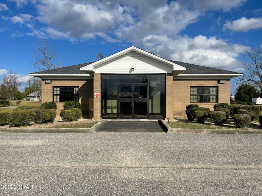 Commercial building previously used as a bank in Altha, FL. The property has a private parking lot with approximately 18 parking spaces and a handicap. There is a two-lane drive through with window. There are three large private offices. There is a bathroom and break room with refrigerator, stove and microwave. There is a vault room and three teller stations. The building is in great condition. The property is located on Hwy 71 with high traffic count and great visibility. Property can be Leased for $2250.00 plus sales tax per month with a 5 year lease.