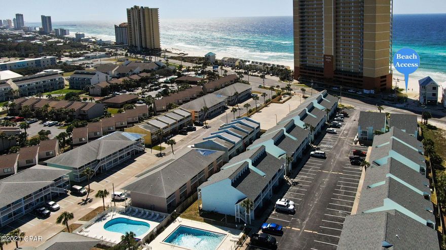 CURRENTLY UNDER CONTRACT, SELLER ACCEPTING BACKUP OFFERS This ground floor 2 / 2 and 3rd bonus room. Sleeps 8 comfortably. This TRIPLE 3 condo is just steps to the beach! 3 sleep rooms, $319,000 selling price and $361 per month HOA. While parking directly outside the unit, you can easily unpack your car and walk across the street to the sandy white beach. This unit was remodeled making the original dining room a bonus room. Remodel includes new butcher block kitchen counter tops, new tile back splash, new paint, old wall paper removed, all tile floor and grout steam cleaned, new ceiling fans and some new glass. This complex has recently undergone a complete exterior renovation including hardie board siding and a new roof with all assessments paid. Was taken off the market to refresh from non-stop vacation rental customer