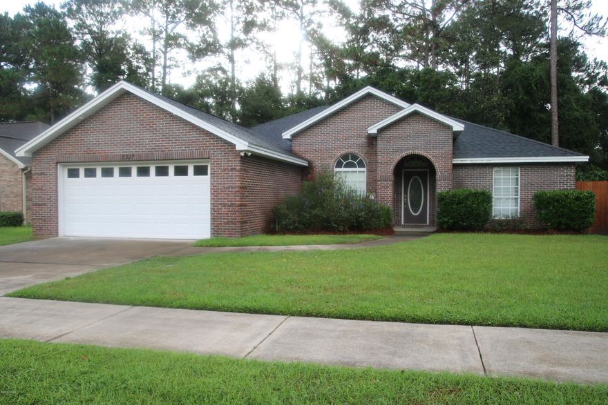 HUGE PRICE REDUCTION!!! This Lovely Custom Home is one you DO NOT want to miss!! Kitchen is will inspire you; granite, maple cabinets, open, stainless steel appliances! Control the lights, sprinkler, garage door from your phone (completely connected to WINK)!! AND, wired for surround sound!! Gorgeous back yard, darling patio with a fire pit!! Quality of construction - AMAZING - bullnose corners, archways, crown molding, gas fireplace, upgraded lighting and flooring. Location - PERFECT - feel like you are in the country, yet close to Tyndall, shopping...and schools. Call your favorite Realtor, YOU WANT to see this one!!! Please verify dimensions.